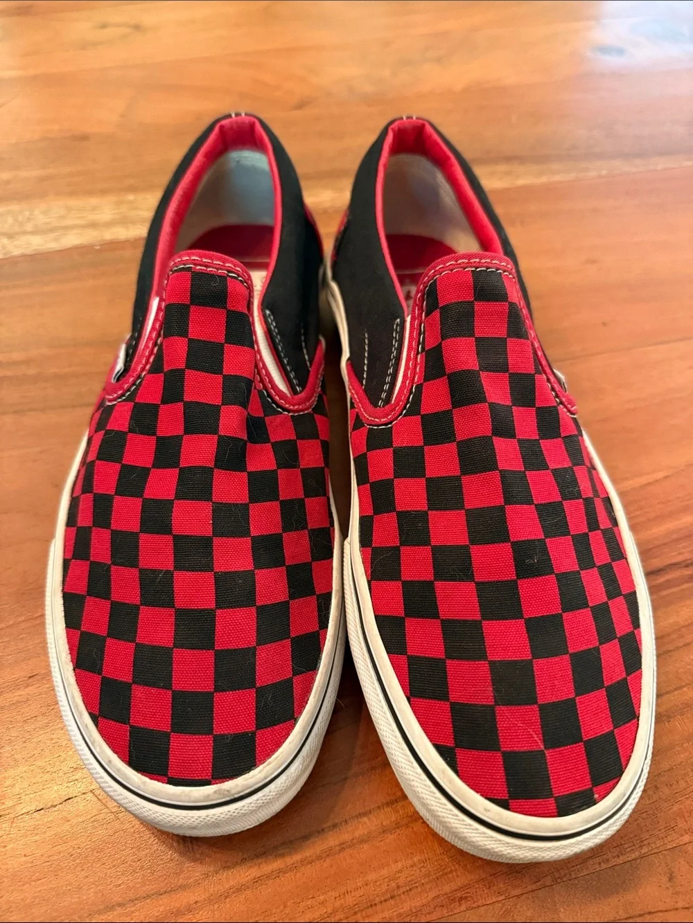Classic red and black checkered Vans. Men’s 8.5